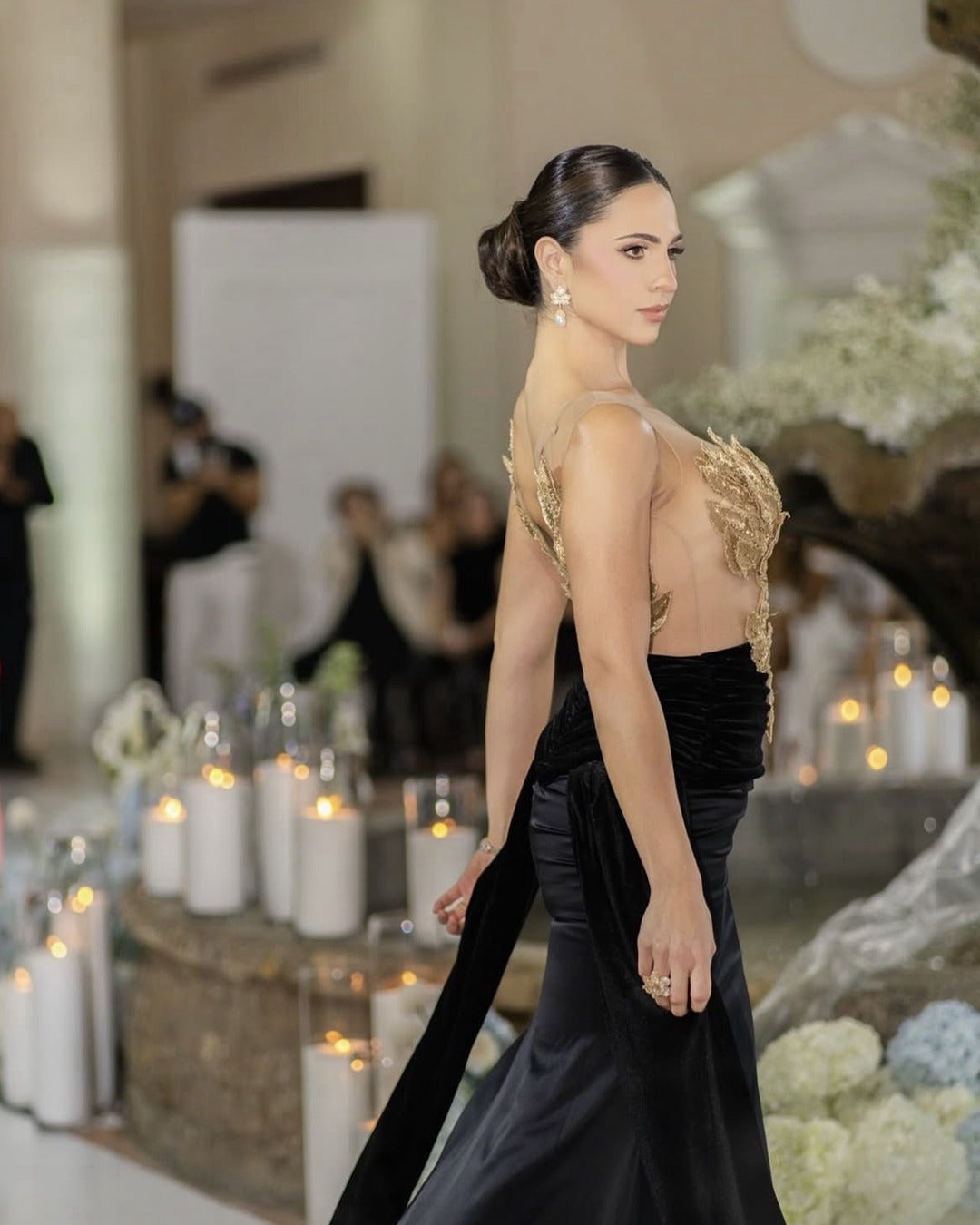 Runway makeup and sleek bun by Lips and Lashes by Yane